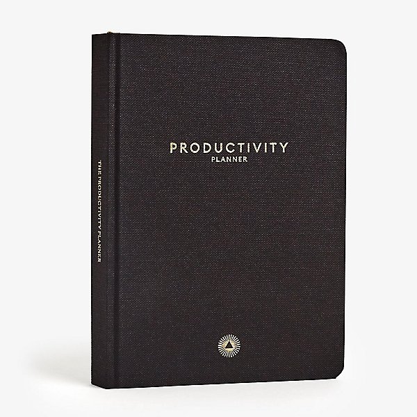 Black book with the word productivity on the front in gold letters.
